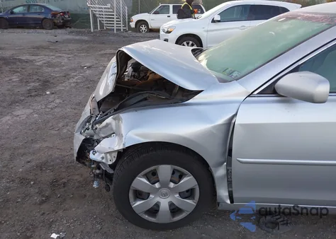 2009 Toyota Camry Le from USA, damaged, VIN 4T1BE46K59U407663